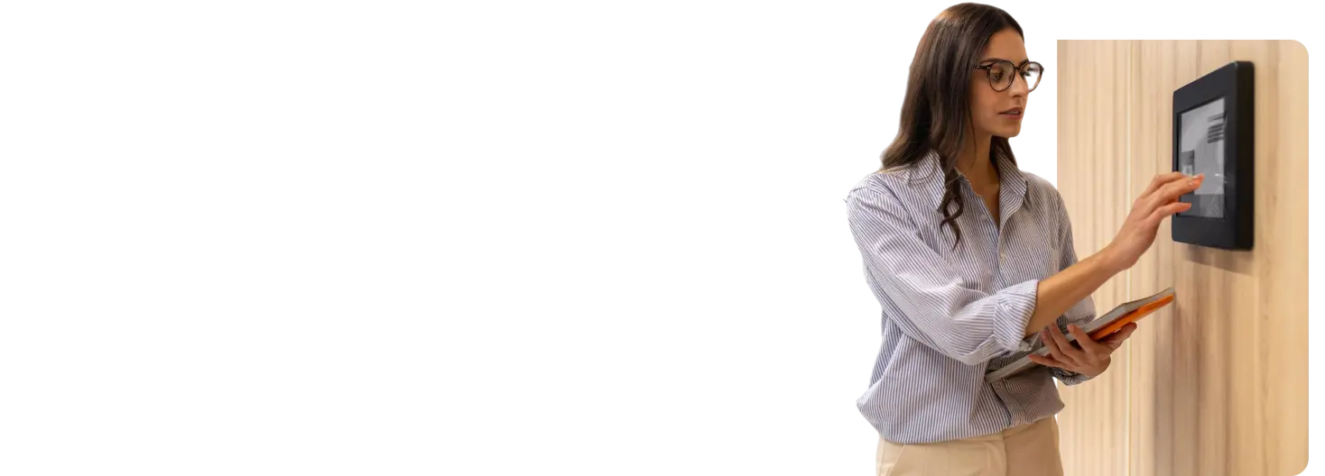 woman-touching-control-panel-wall-corridor